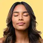 Calm woman with eyes closed, symbolising relief after Emotional Release Therapy