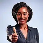 Smiling woman giving thumbs-up, symbolising relief after bladder-lift acupuncture therapy