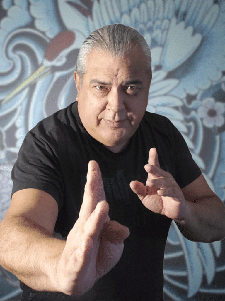 Doc Blackstone in a kung fu stance with white crane in the background