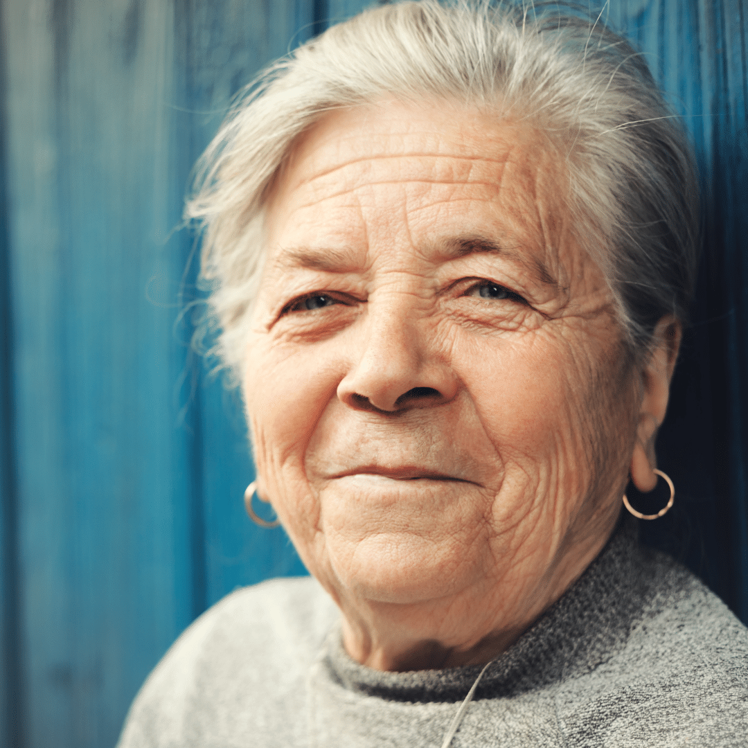 Elderly woman grinning